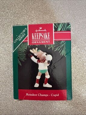 Hallmark Keepsake Ornament - Reindeer Champs Cupid (green, red, white)